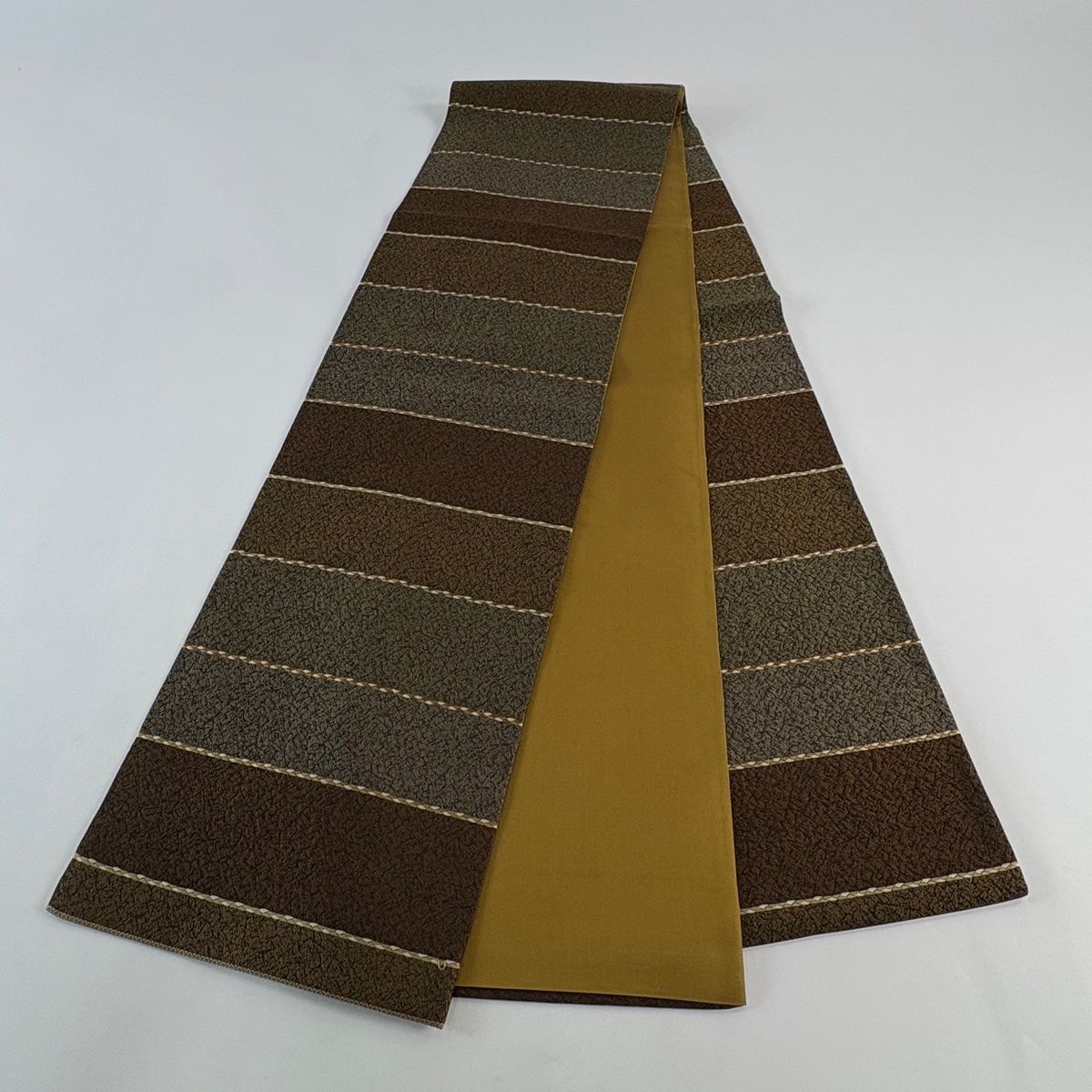 袋帯 秀品 縮彩錦 段縞 幾何学 茶色 全通 正絹 【中古】 - メルカリ