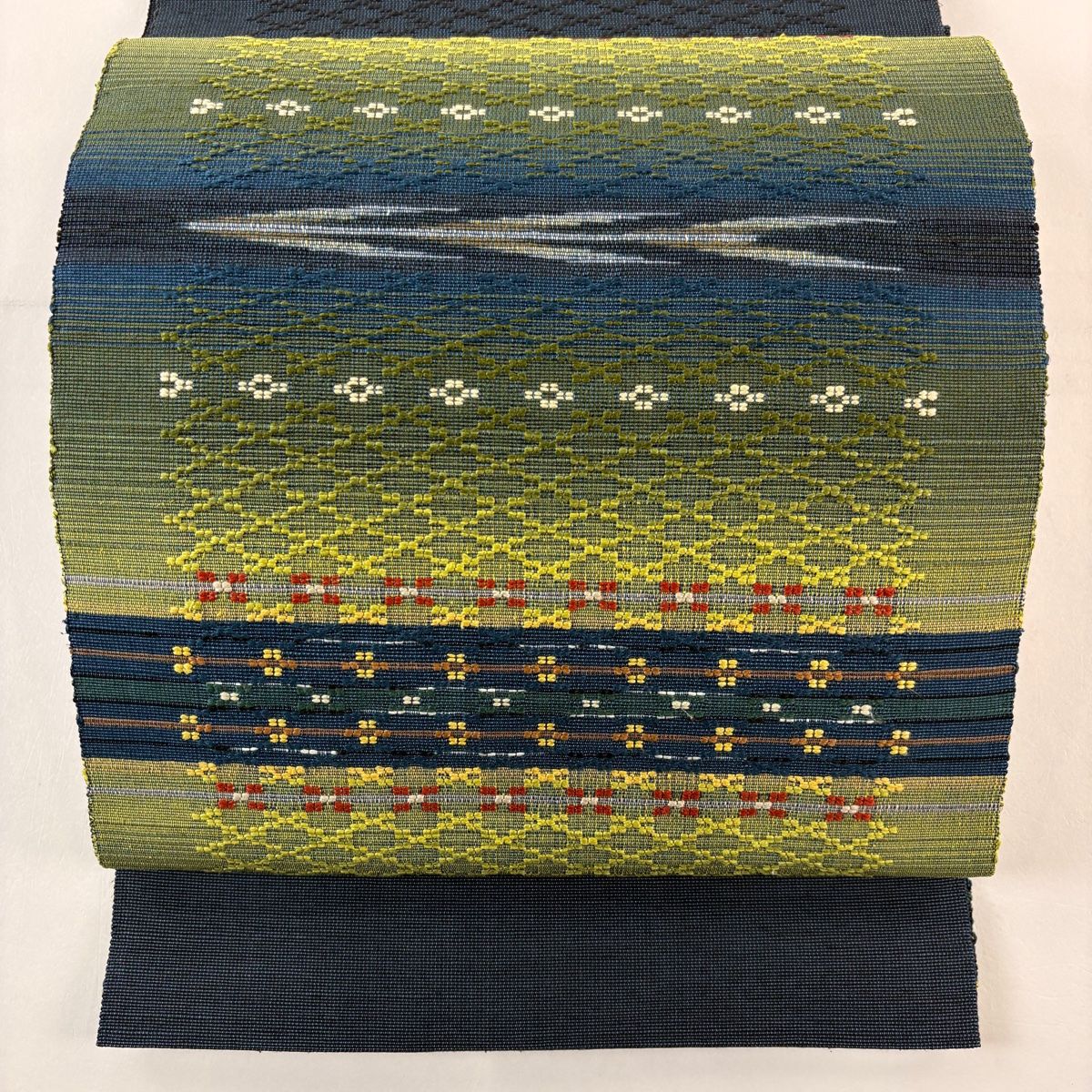 美品】 名古屋帯 逸品 松葉仕立て 八寸名古屋帯 花 幾何学模様 花織 藍