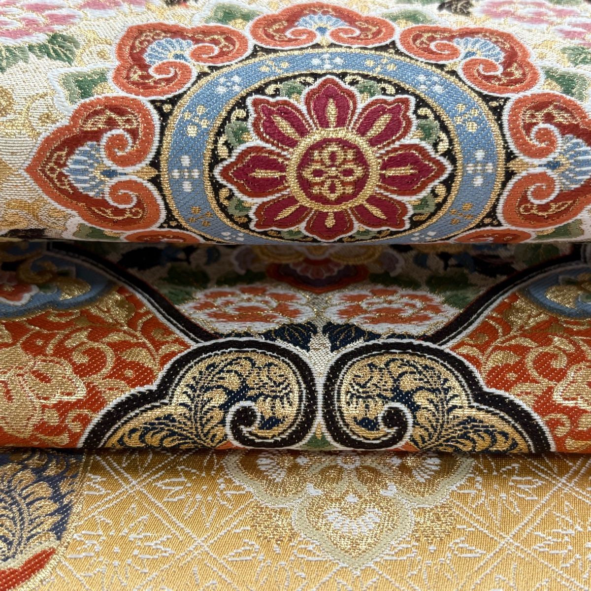 袋帯 細緻伽羅織 華文 草花 金糸 箔 薄オレンジ 六通 正絹