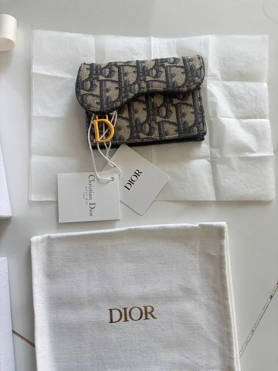 ディオール オブリーク サドル 財布