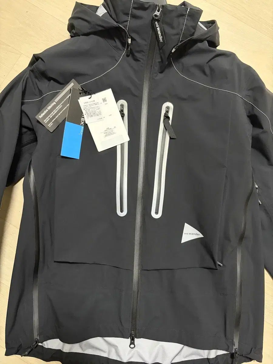 アンドワンダー and wander パーテックス シールド レインジャケット m