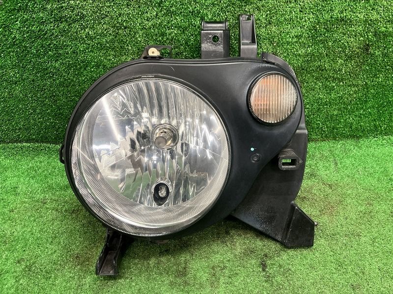 ラパン HE21S 左ヘッドランプ・ヘッドライト SS コイト 100-59053