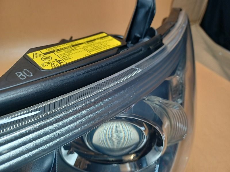 コーティング済 エスティマ AHR20W 左ヘッドランプ・ヘッドライト X