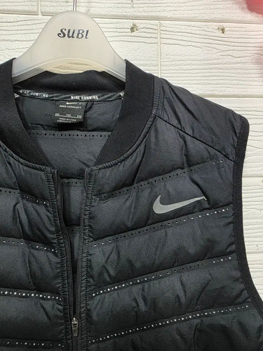 ナイキ エアロロフト 軽量 ダウン ベスト 110