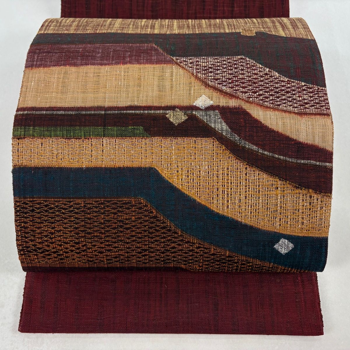 美品】 袋帯 名品 渡文 落款 さざ波 両面 幾何学 箔 赤紫 お太鼓柄