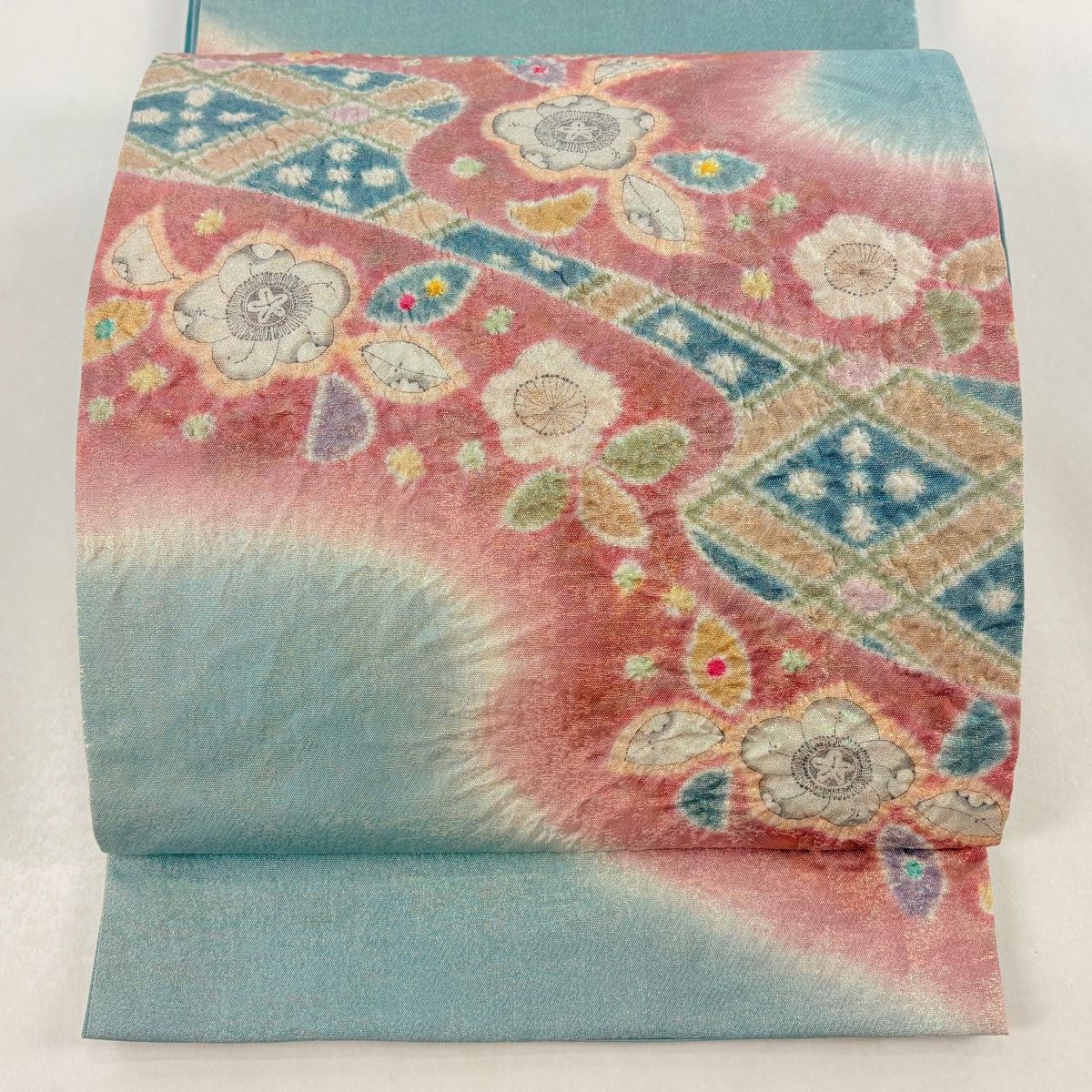 袋帯 落款 草花 霞 金通し 絞り 薄緑 お太鼓柄 正絹