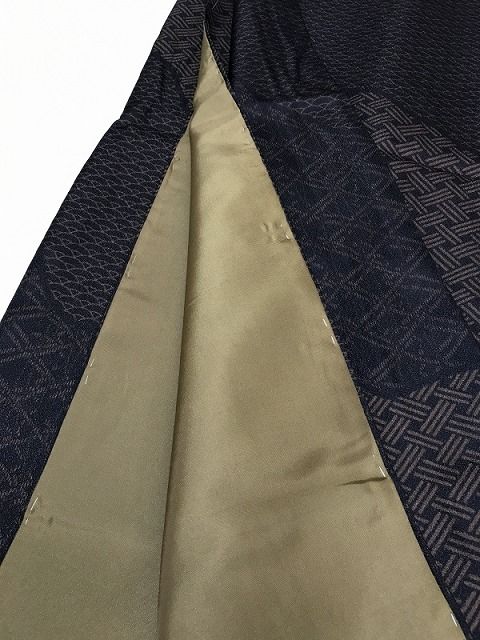 化繊 こげ茶地に寄せ柄模様