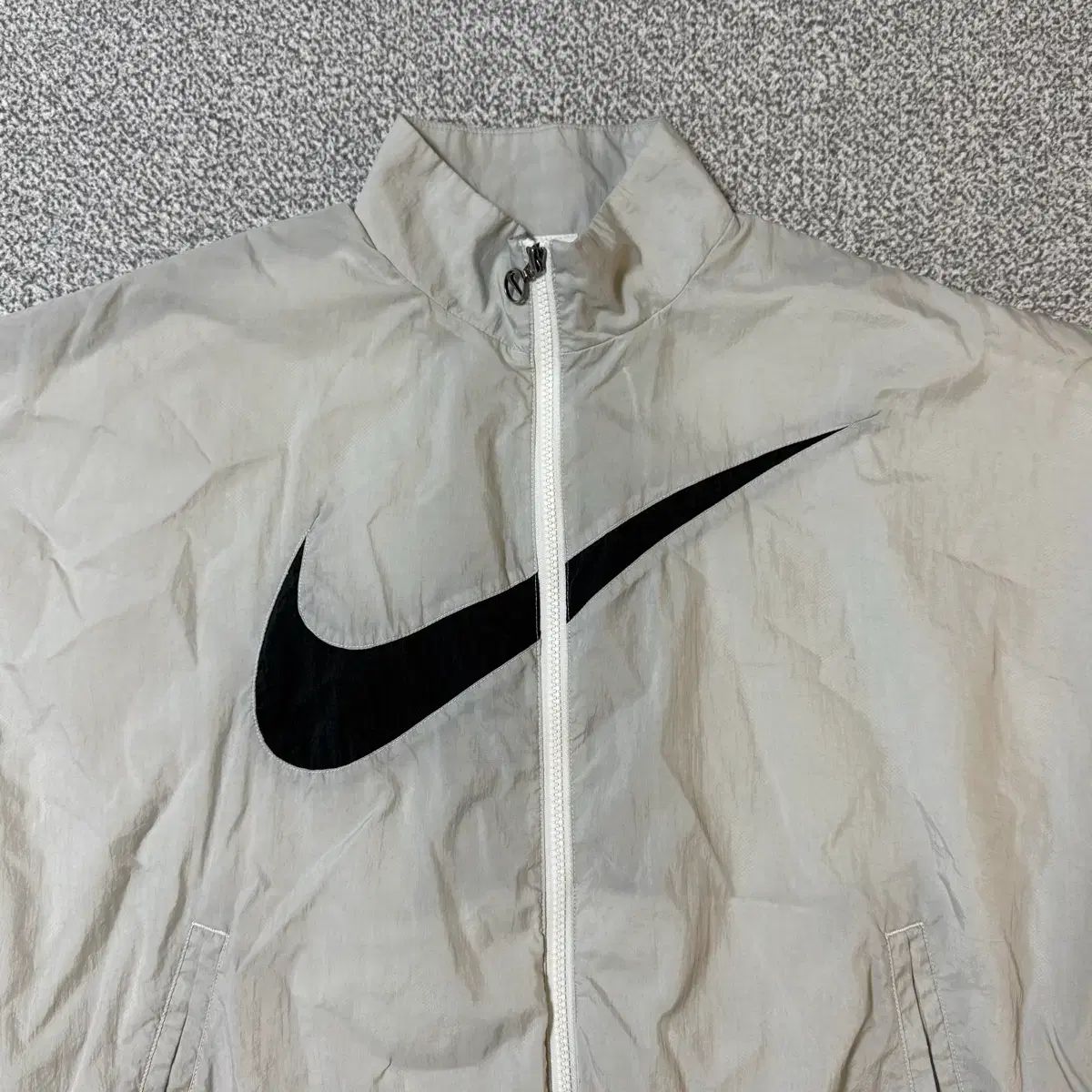 ナイキ ウィンドブレーカー レディース M - メルカリ