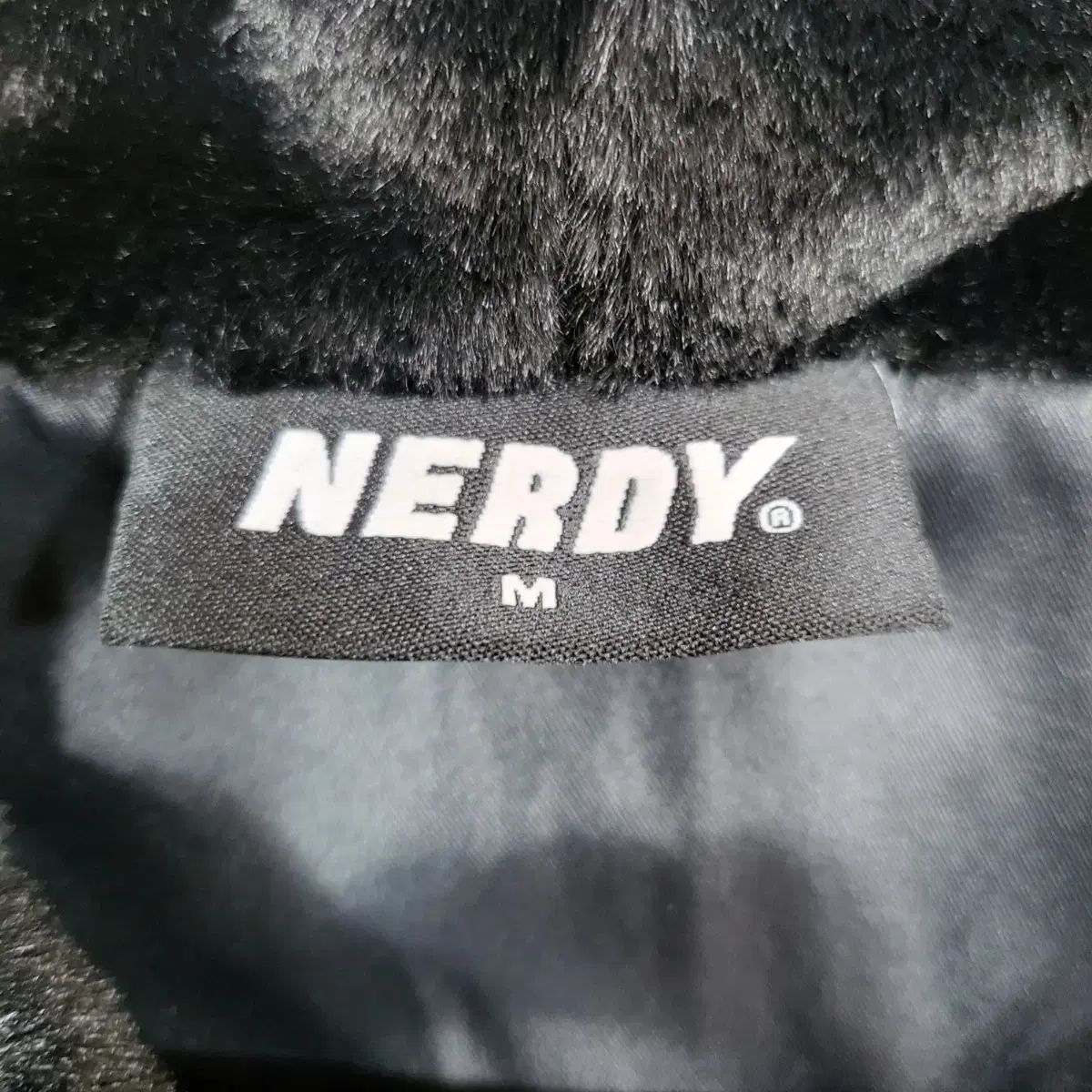 ノルディ NERDY ブラック ファー フーディー ジップアップ - メルカリ