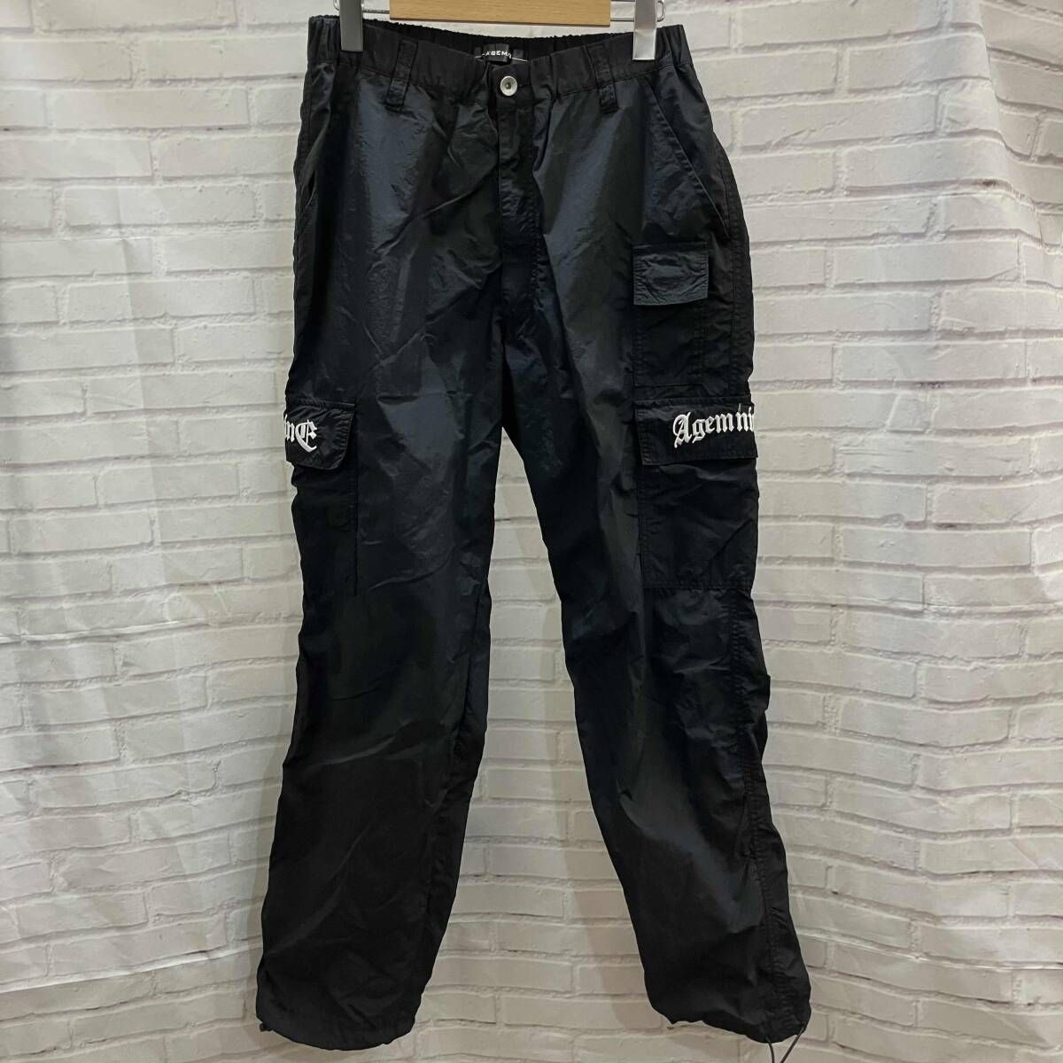 A'gem 9エージェム ナイン ブラックカーゴパンツ A'GEM/9 × .kom 『A'GEM/9/エージェムナイン』 蛇腹カーゴパンツ A'GEM