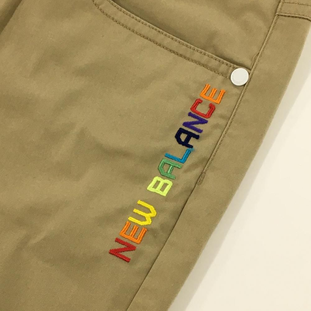 美品】ニューバランスゴルフ 七分丈パンツ ベージュ ロゴマルチカラー