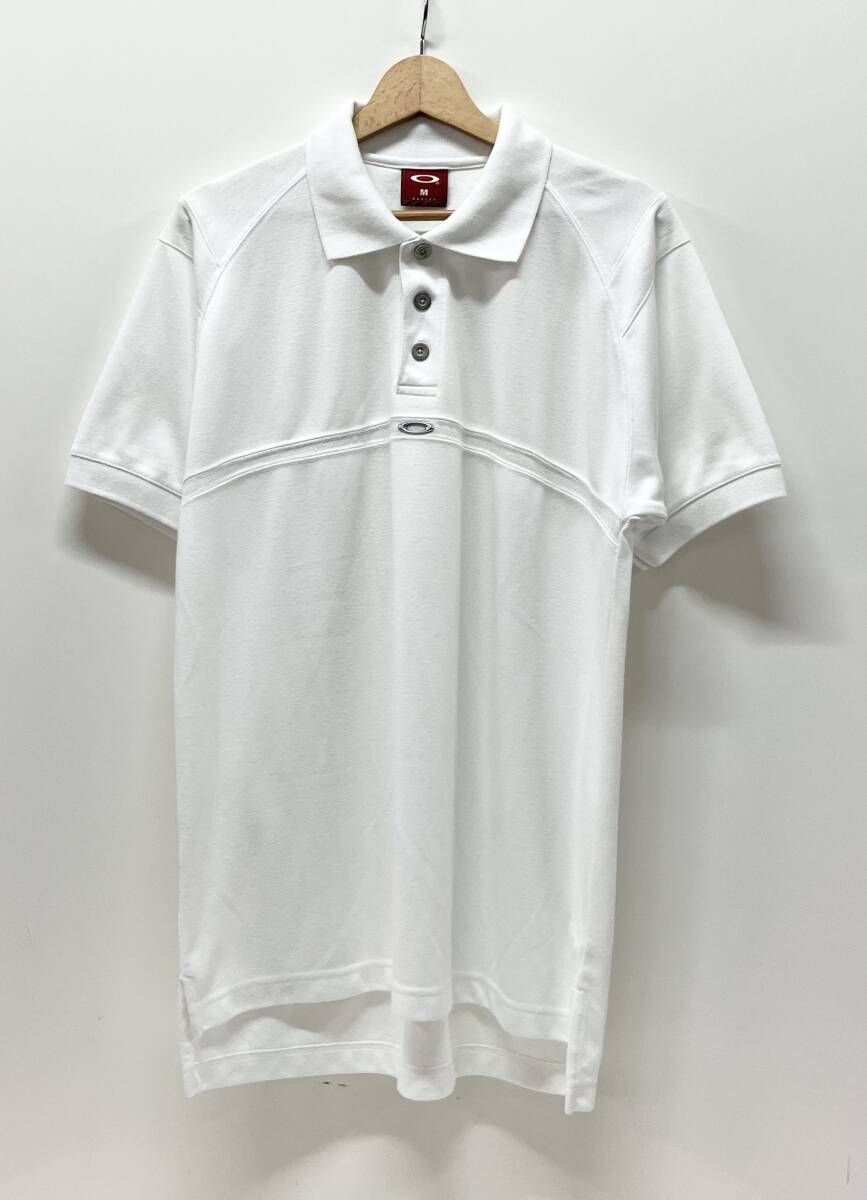 OAKLEY 半袖ポロシャツ 90 S メタルボタン プルオーバー ロゴ サイズM ホワイトクールマックス タイ製 羽毛立ち有り