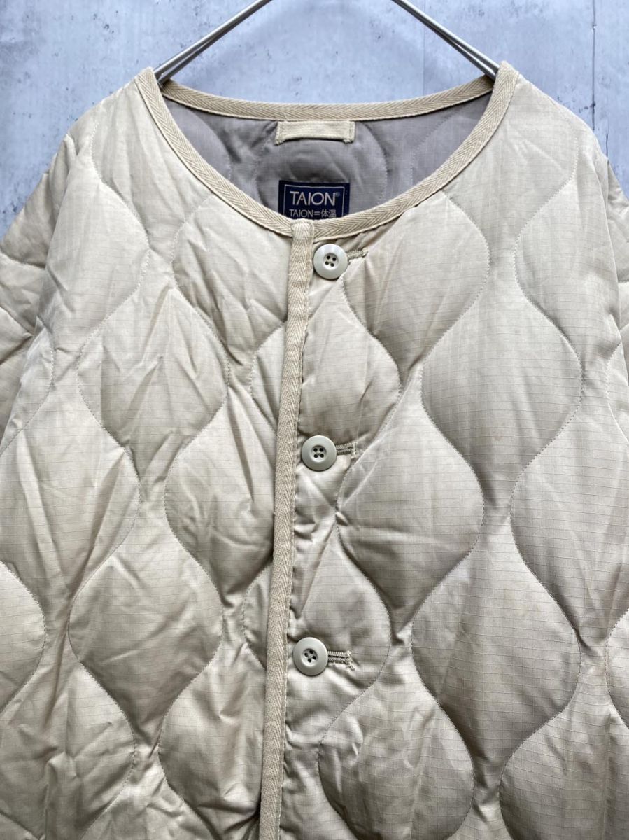 TAION タイオン ノーカラーパイピングキルティングダウン ロング