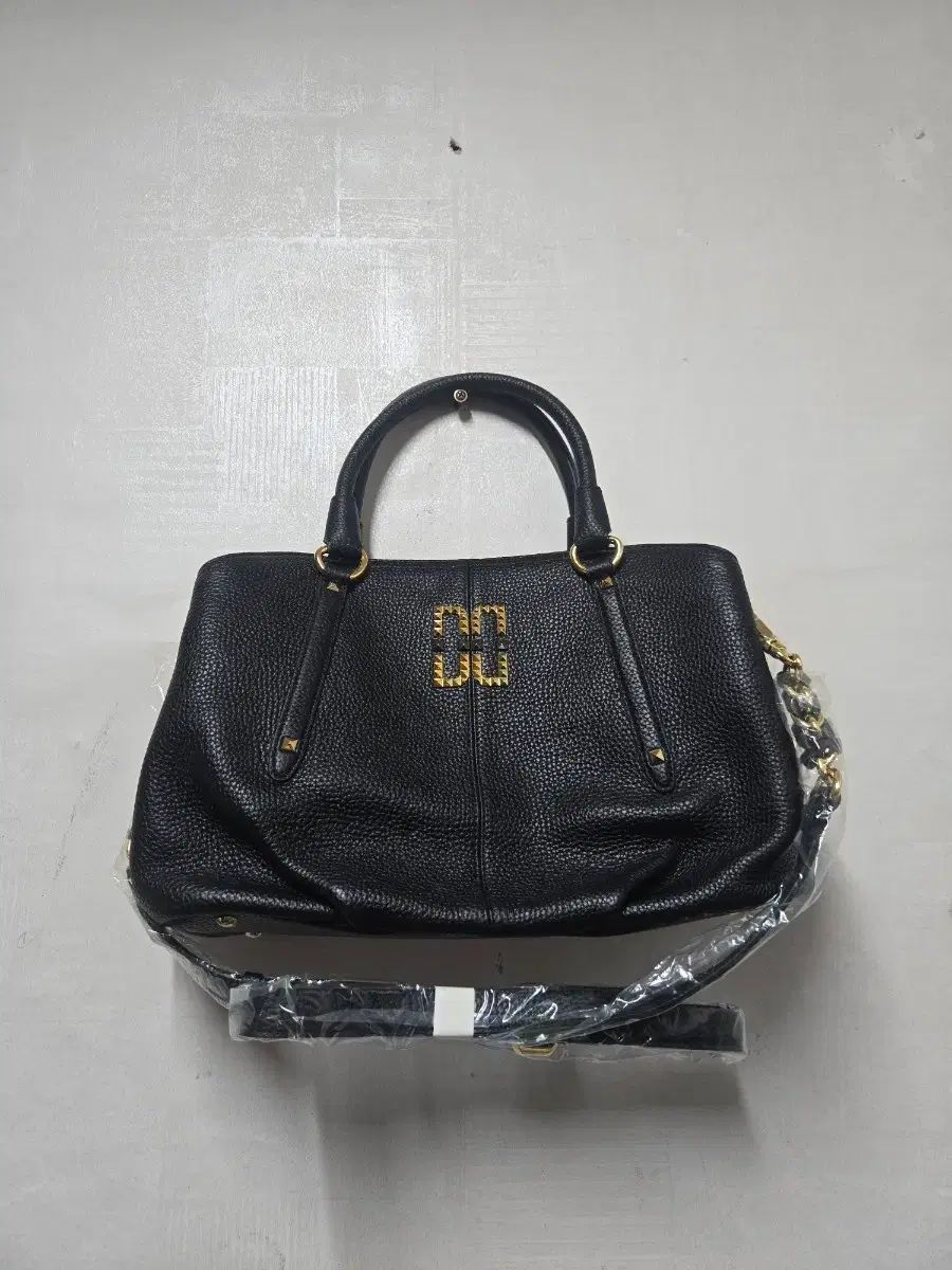 ダックス スタッズ ロゴ トート クロスバッグ