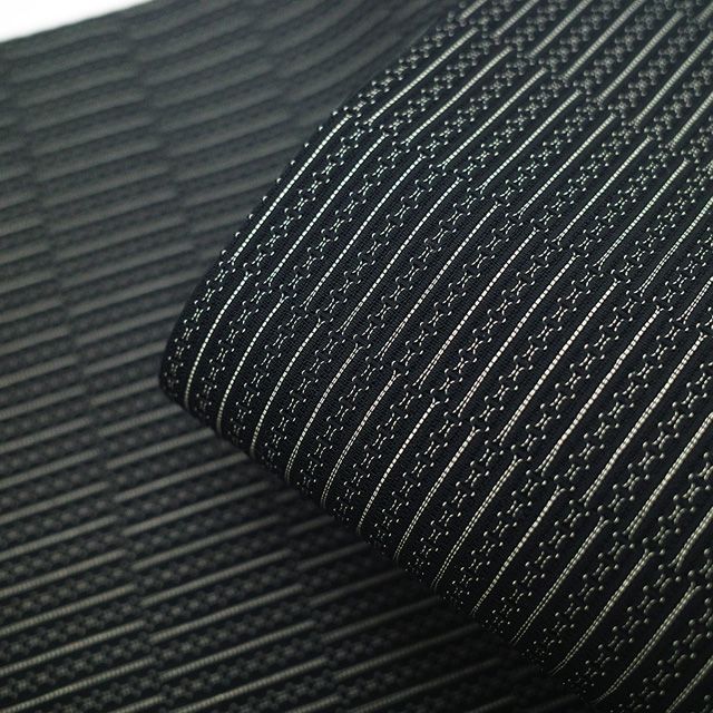 新古品】 夏物 名古屋帯 未使用 正絹 羅 全通 九寸 黒地 黒 白 変わり