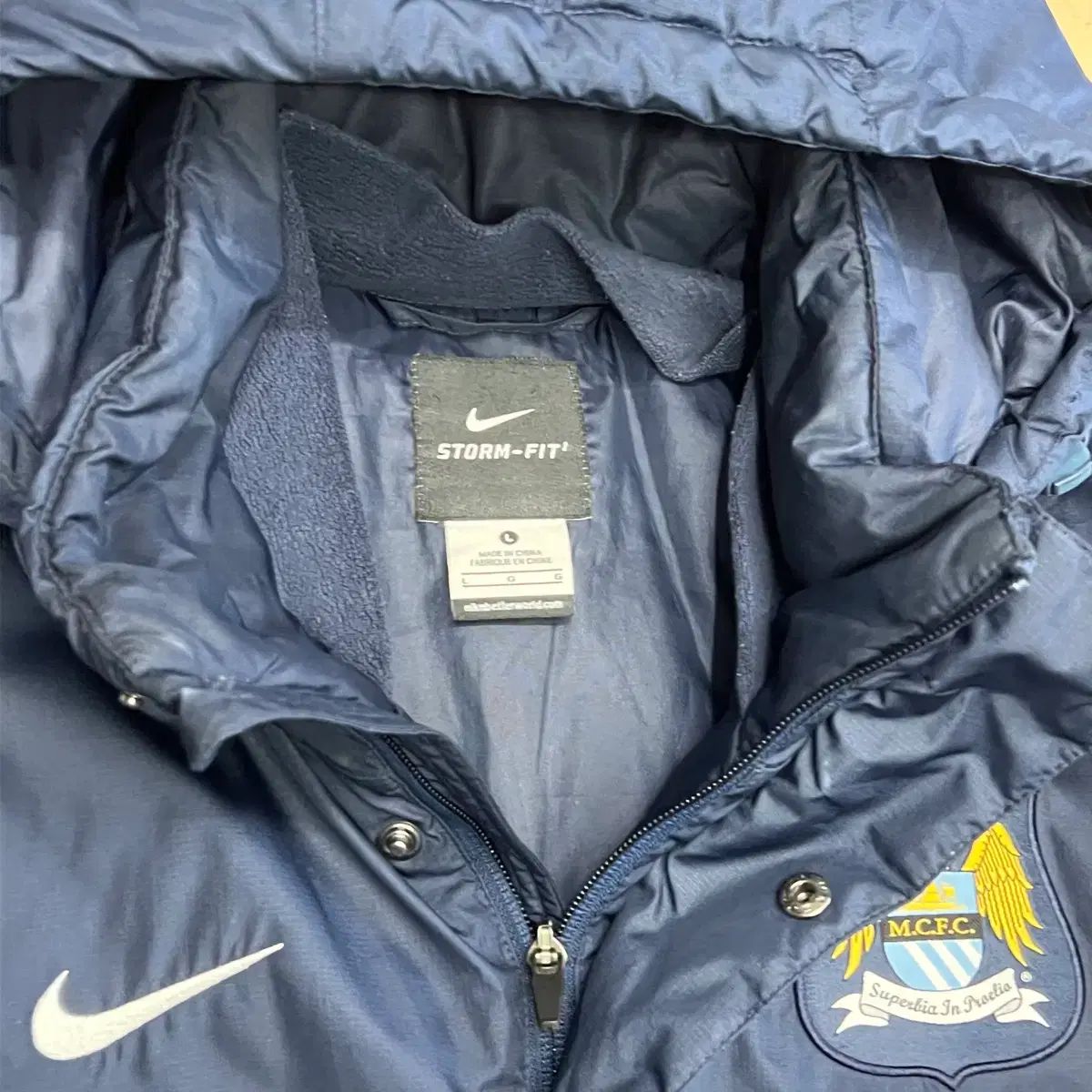 L NIKE 節約 マンチェスターシティ オールドロゴ ダウン ナイキ