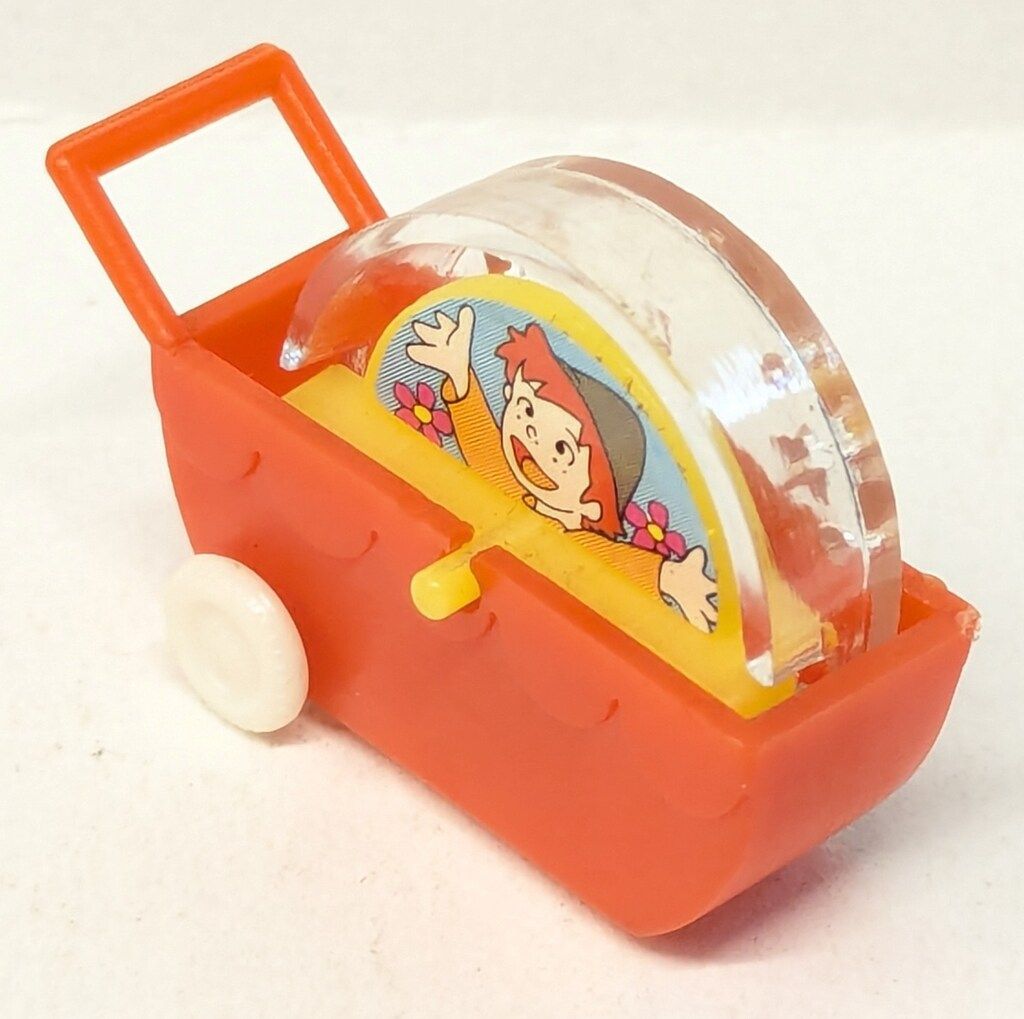 江崎グリコ おまけ ベビーカー(絵柄が回転) 40mm - メルカリ