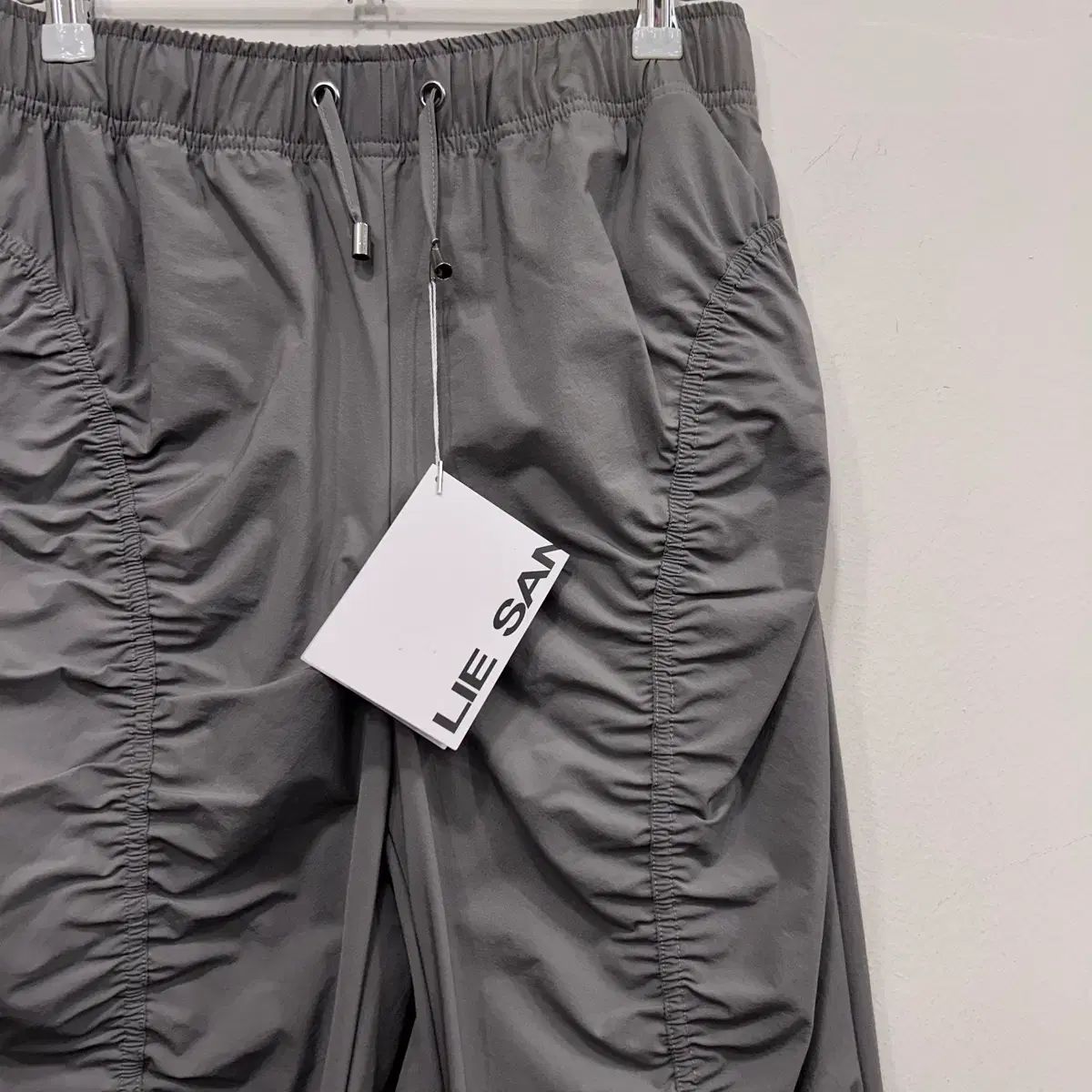 LIE SANGBONG ストレッチナイロン シャーリング トラックパンツ