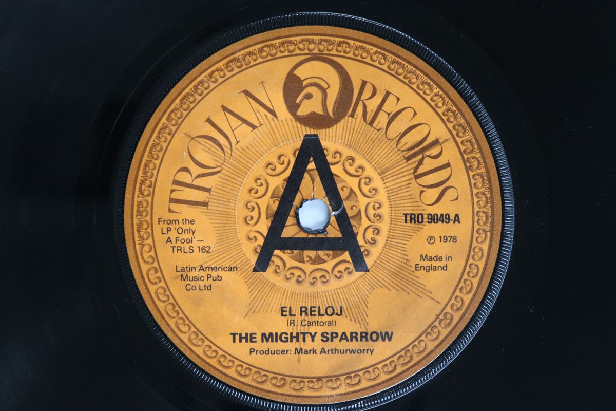 英7” Mighty Sparrow El Reloj / I Just Wanna Be Free TRO9049PROMO