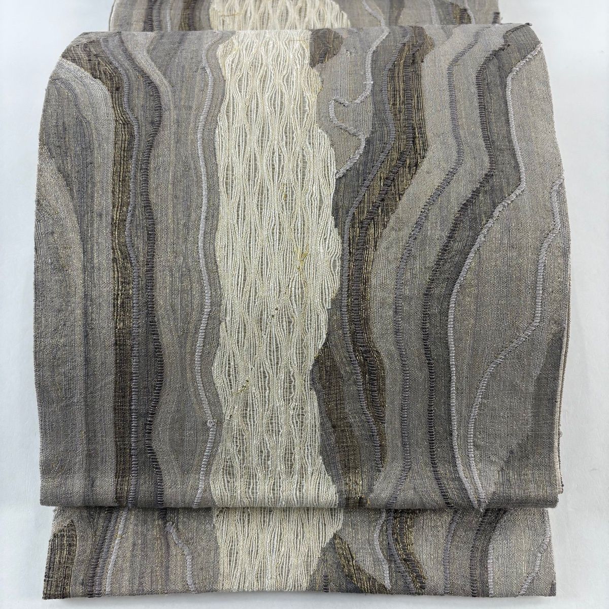 袋帯 秀品 紬地 幾何学 金糸 灰色 全通 正絹