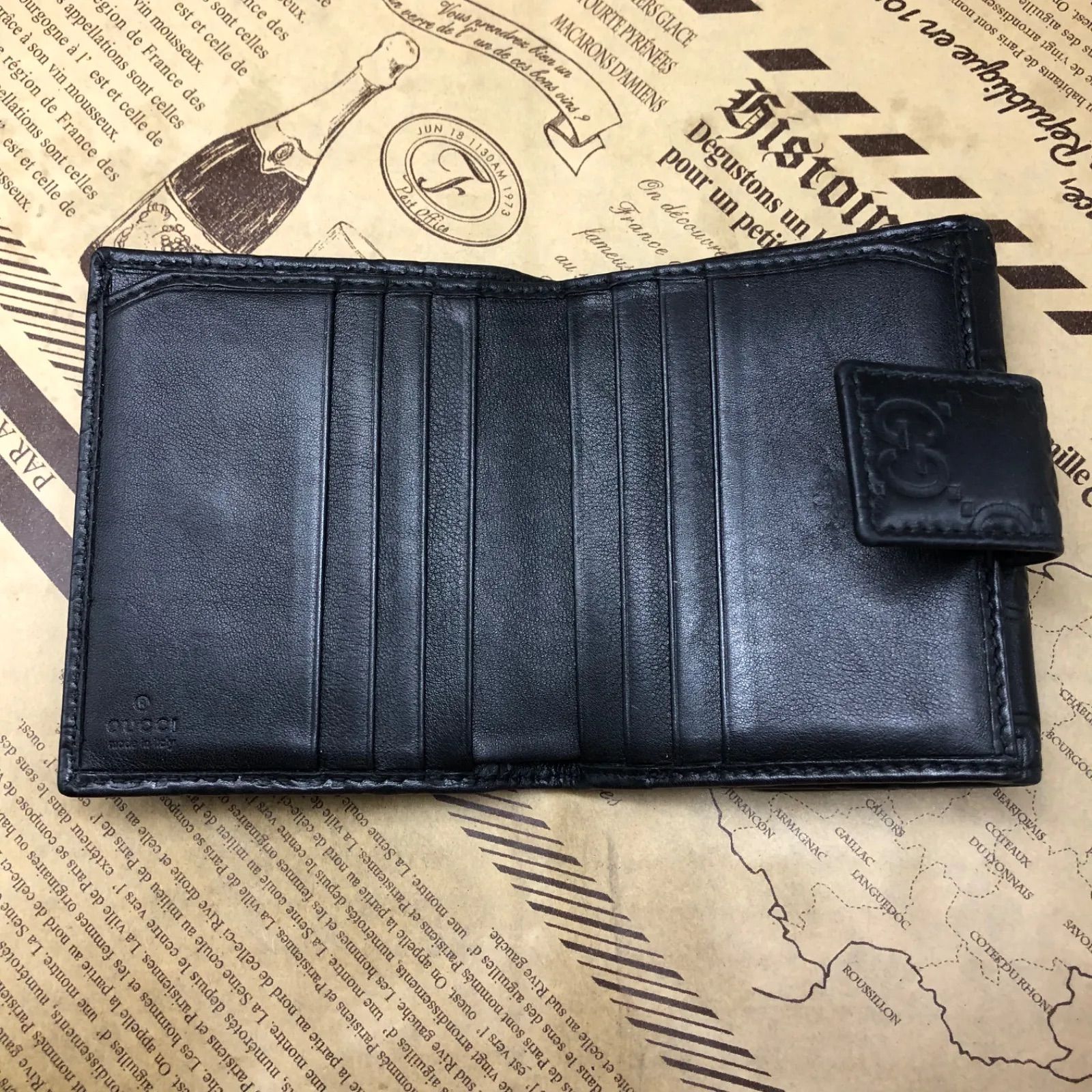 グッチ 折財布 コンパクトGG シマレザー 黒 FX33 - メルカリ