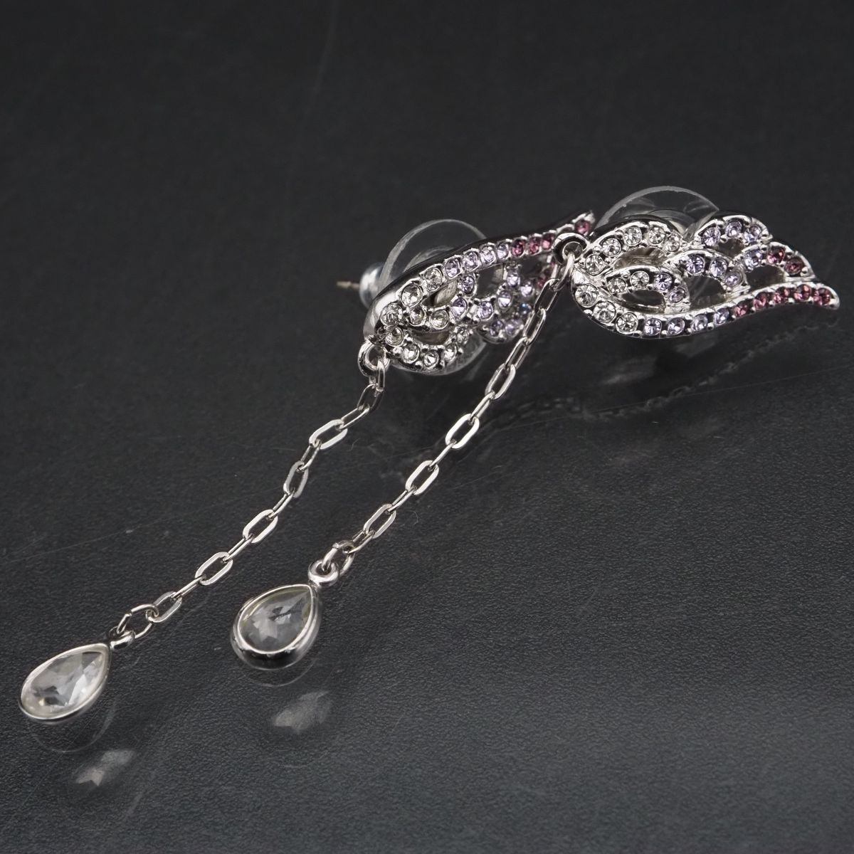 J581 スワロフスキー SWAROVSKI ピアス 羽 フェザー パープル系カラー