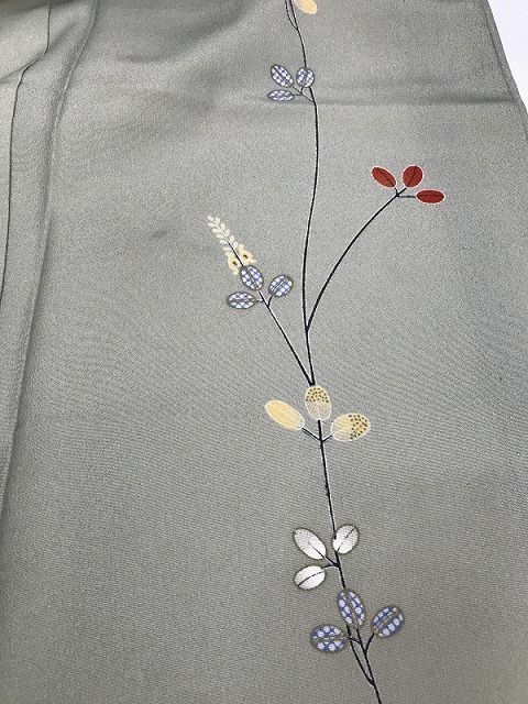 化繊 青磁色地に枝花模様