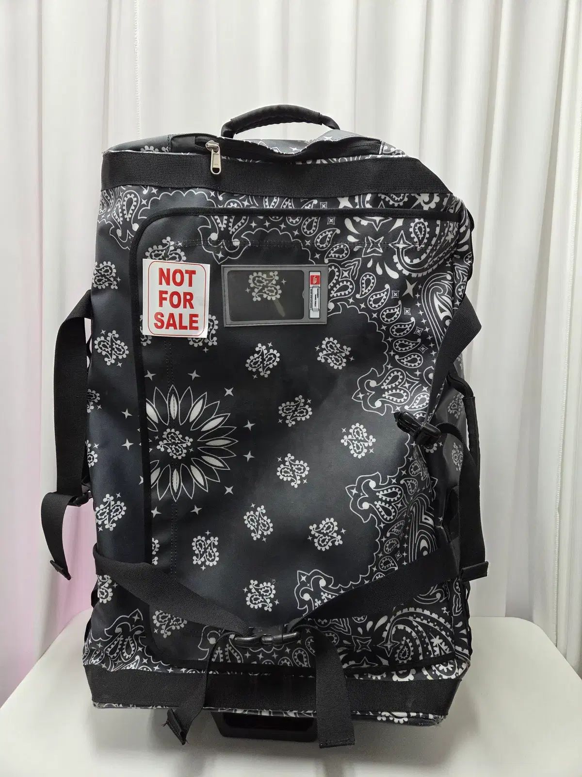 シュプリーム X ザノースフェイス ベイズリー ロールリングバッグ キャリアー