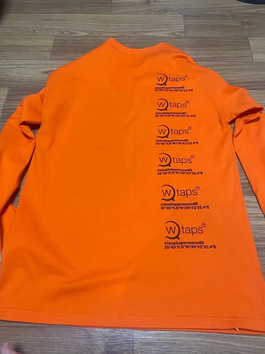 WTAPS オレンジ色 長袖 Tシャツ - メルカリ
