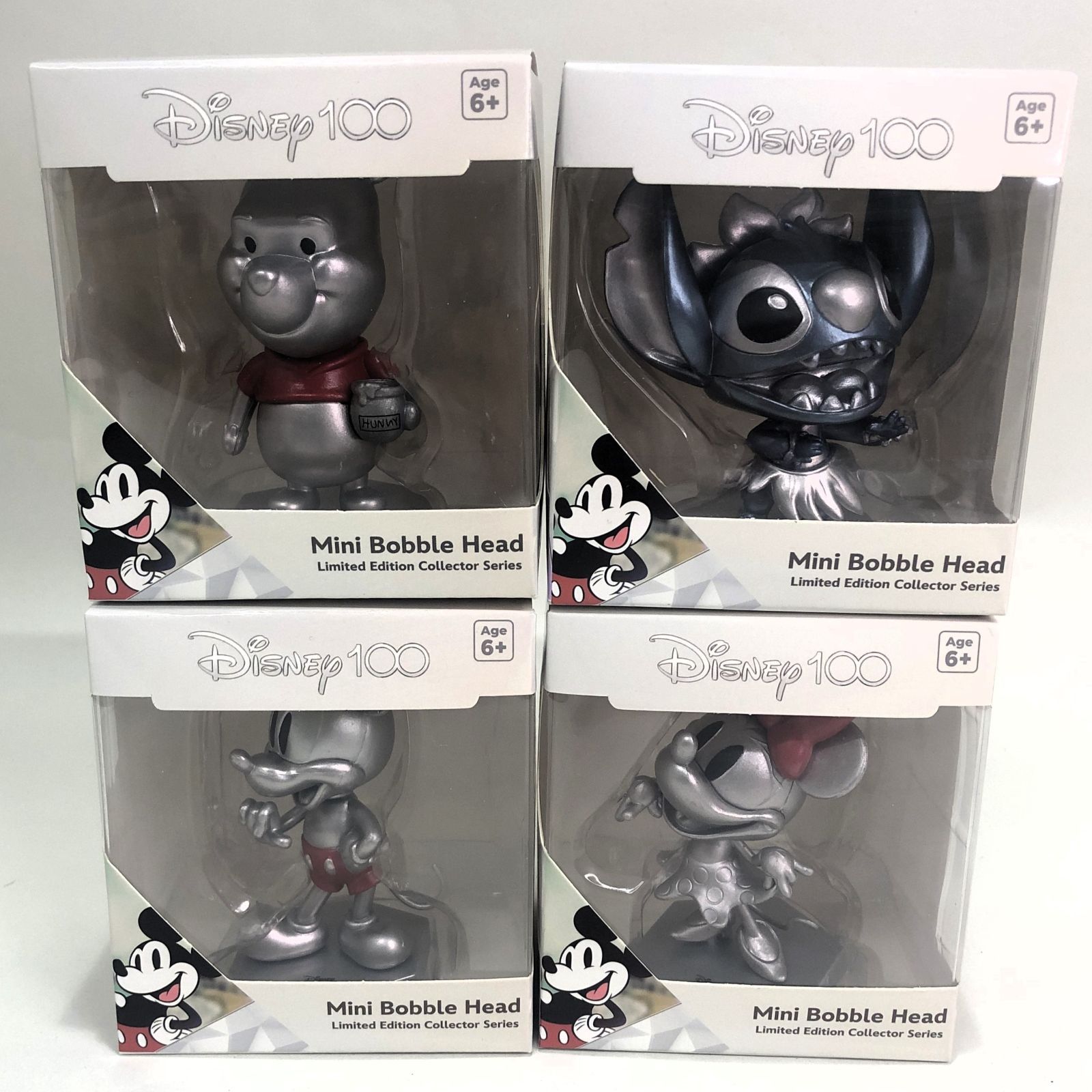 ディズニー100周年記念ボブルヘッド4体セット｜ミッキー・ミニー・プー