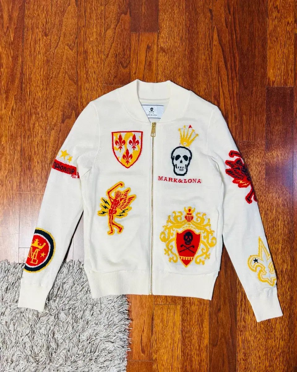 MARK & LONA マークアンドロナ レディース ムーン柄防風ニットジップ