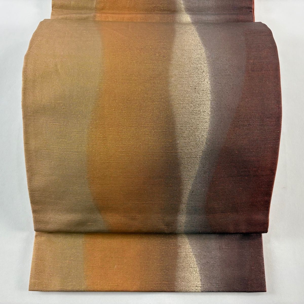 袋帯 秀品 証紙 大島紬地 幾何学模様 金彩 赤茶 全通 正絹