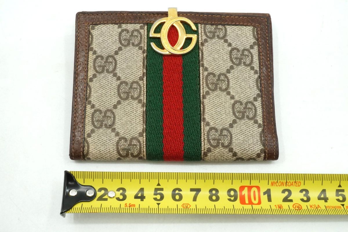 8*様 GUCCI ゴールド 二つ折り財布 グッチ GGマーク GUCCI GGマーク