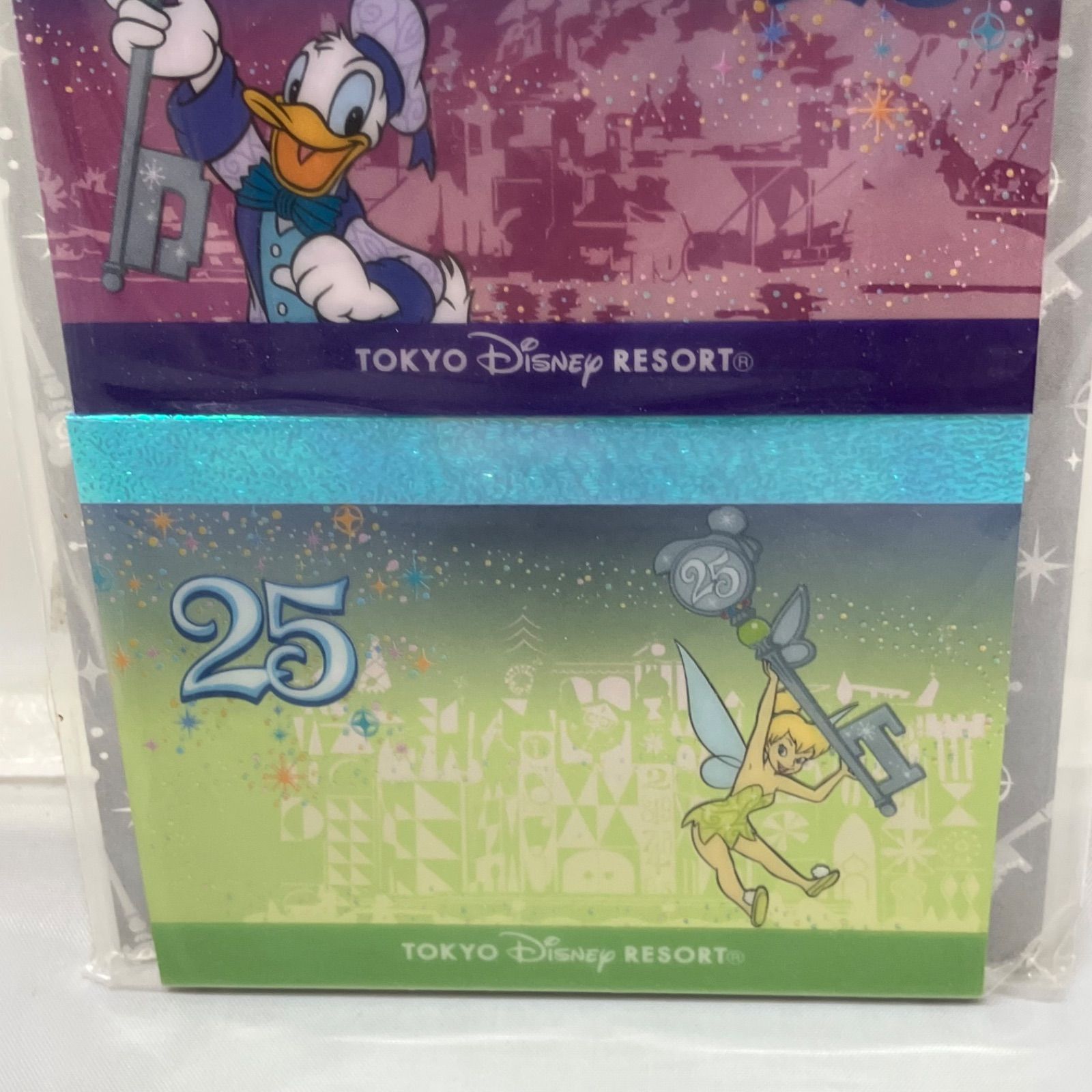 新品】東京ディズニーリゾート 25周年記念メモ帳 2点 - メルカリ