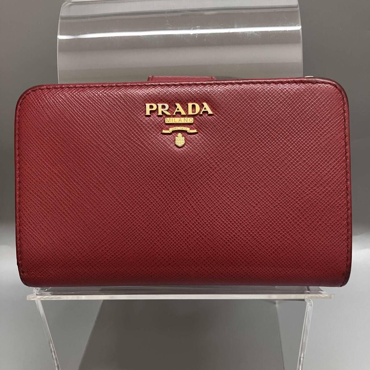 PRADA プラダ 二つ折り ラウンドジップ財布 レッド - メルカリ