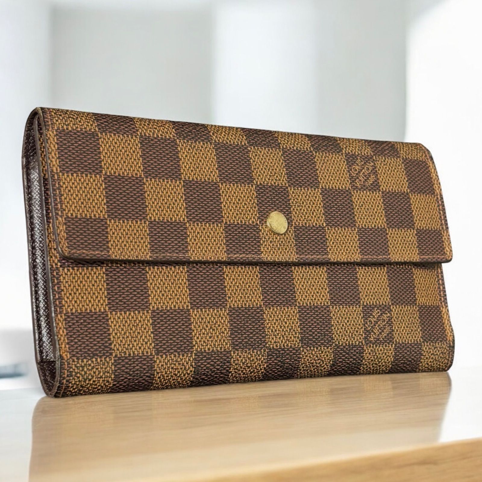 t 24 ポルト トレゾール ポルトフォイユ インターナショナル ダミエ エべヌ ルイ ヴィトン Louis Vuitton 3つ 三つ 折り フラップ ボタン 式 長 財布 ロング ウォレット 小銭入れ コインケース 付き