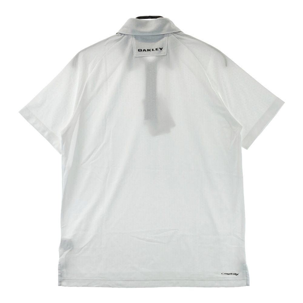 サイズ M OAKLEY オークリー 半袖ポロシャツ 総柄 ホワイト系 ゴルフウェア メンズ ストスト