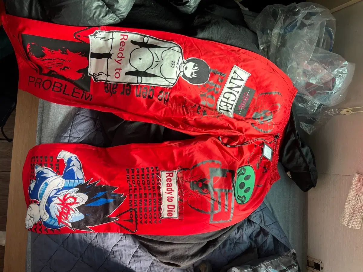 ハンドスクート レッド ROCK ズボン ユニセックス