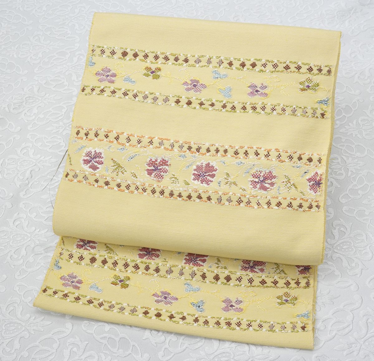 未仕立 西陣織 八寸名古屋帯 帯屋捨松 ペルシャモール段文 手縫い仕立代込