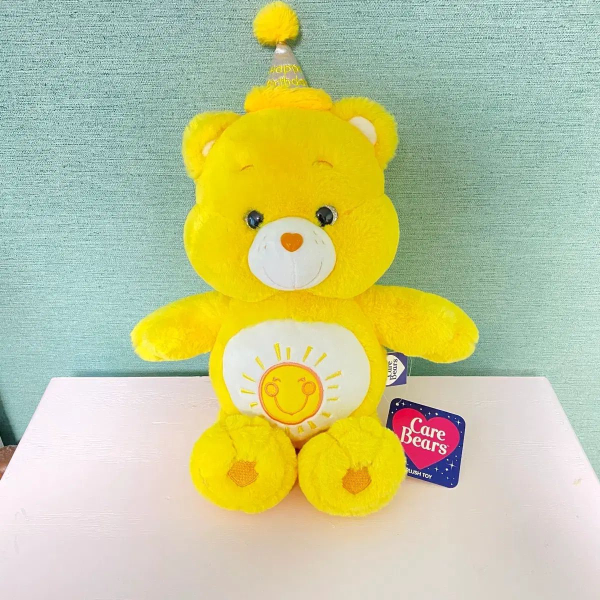 ケアベア サンシャインベア 誕生日帽子 ぬいぐるみ 新品 - メルカリ