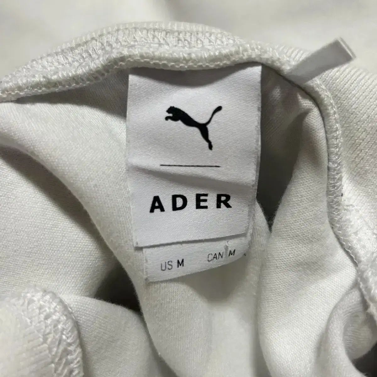 プーマ Ader Error ネックロゴ タートルネック (M) - メルカリ