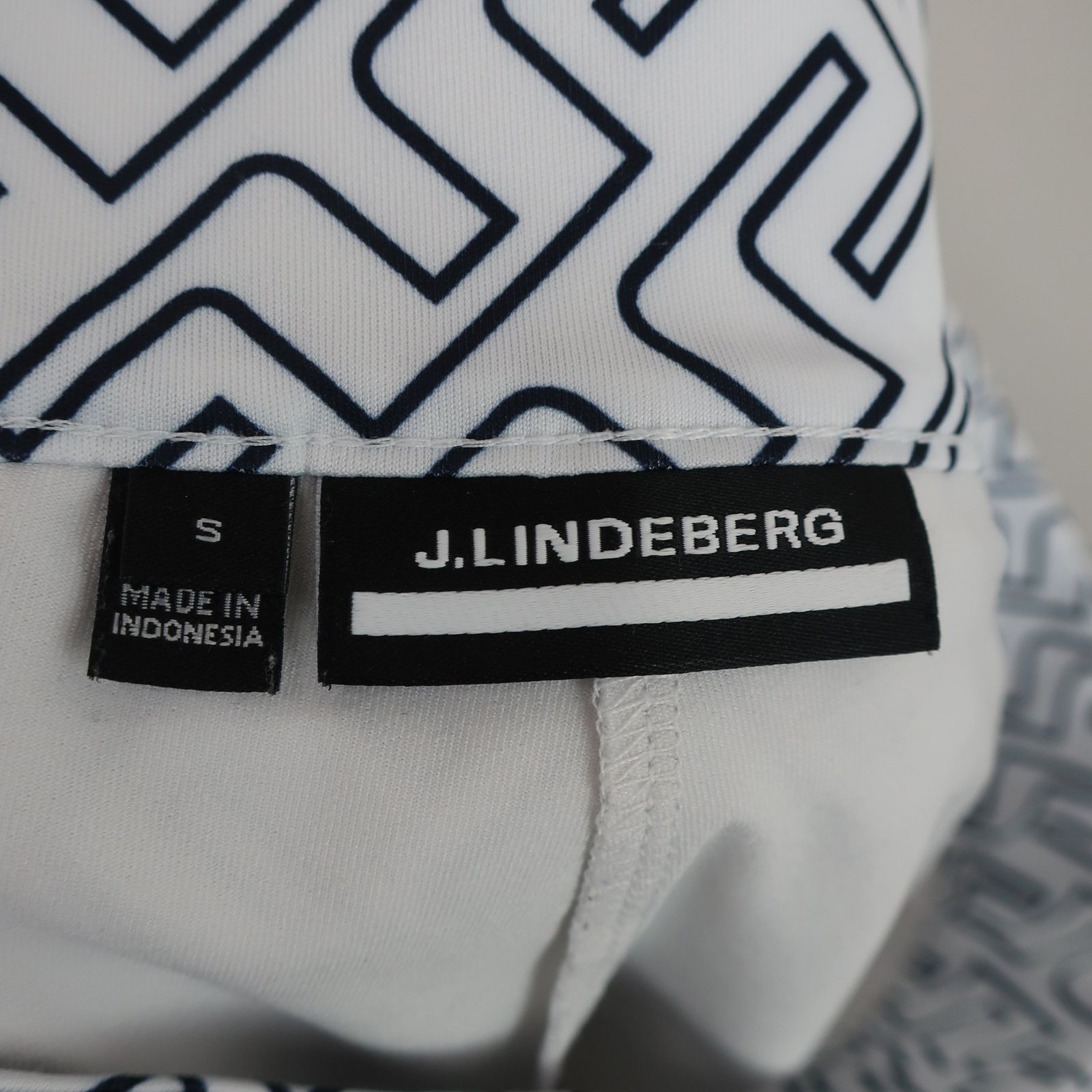 【新品】 J.LINDEBERG ジェイリンドバーグ ニット スカート ホワイト J.LINDEBERG(ジェイ リンドバーグ) スカート 白ネイビー総柄