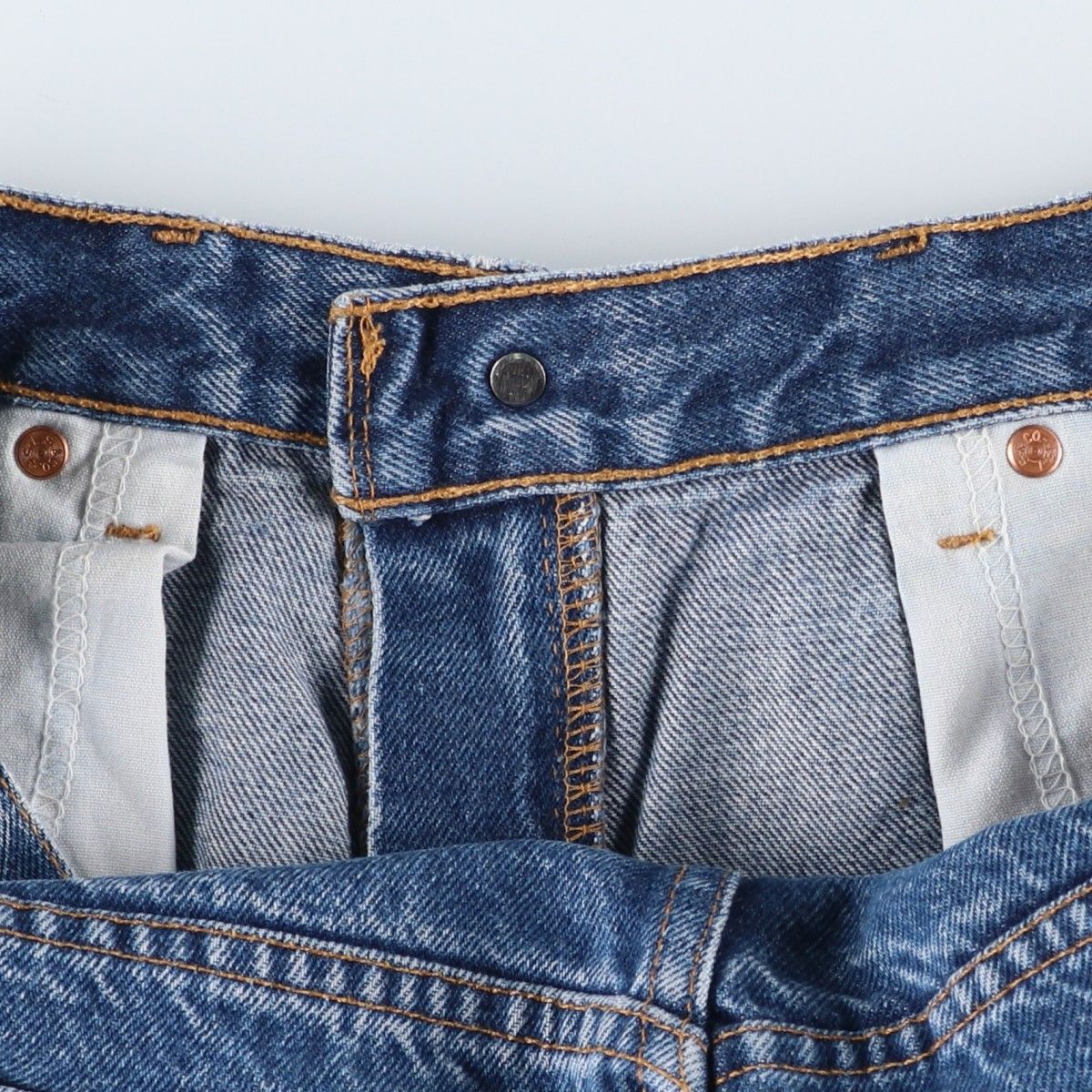 550 テーパードデニムパンツ