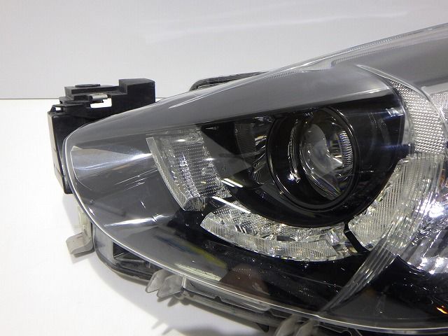 デミオ 左ヘッドライト LED DJ 前期 100-18373 Z D09L-51-041F