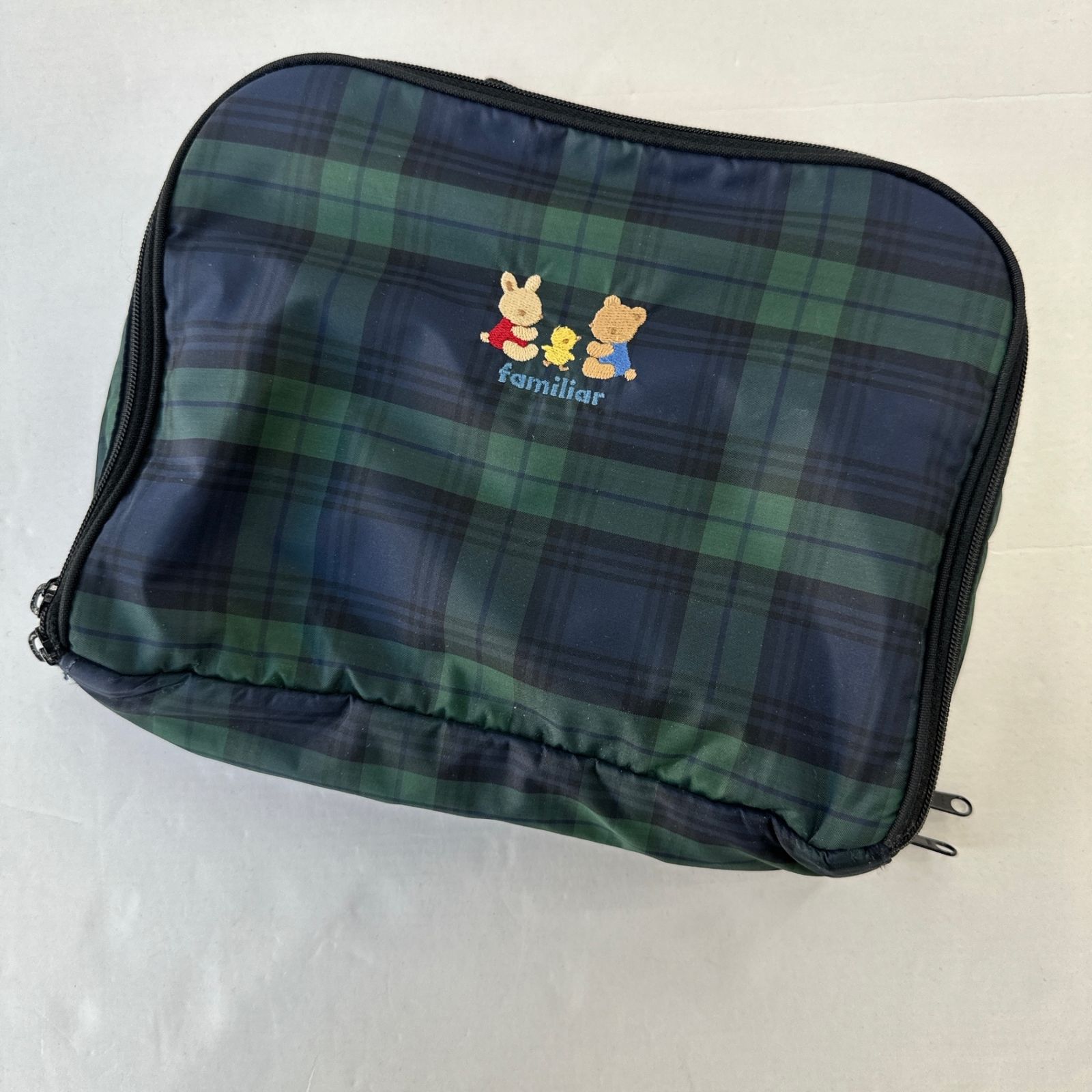 ファミリア おむつポーチ ネイビー×グリーン - メルカリ