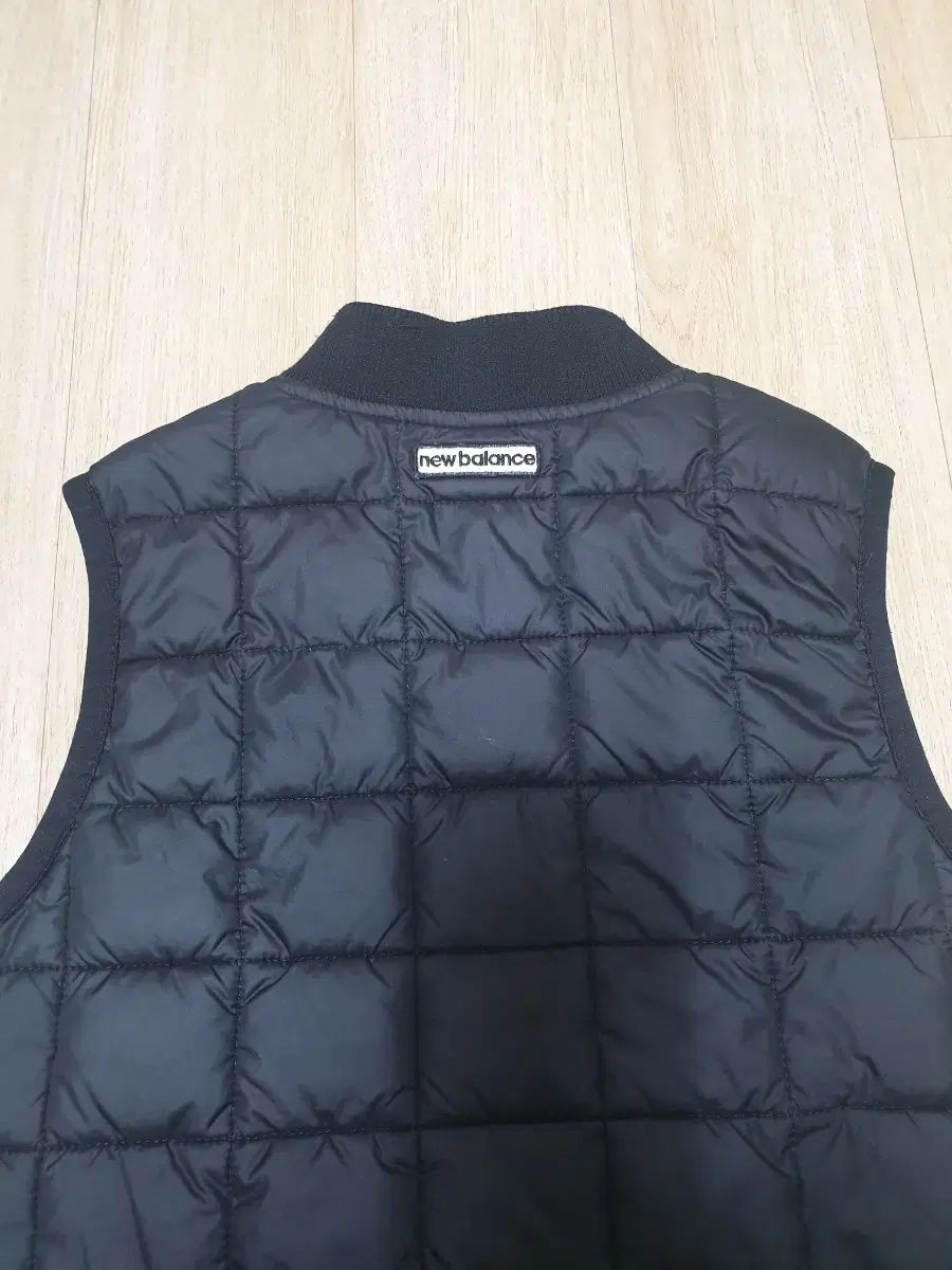 ニューバランス キッズ ベスト 軽量ダウン(110) - メルカリ