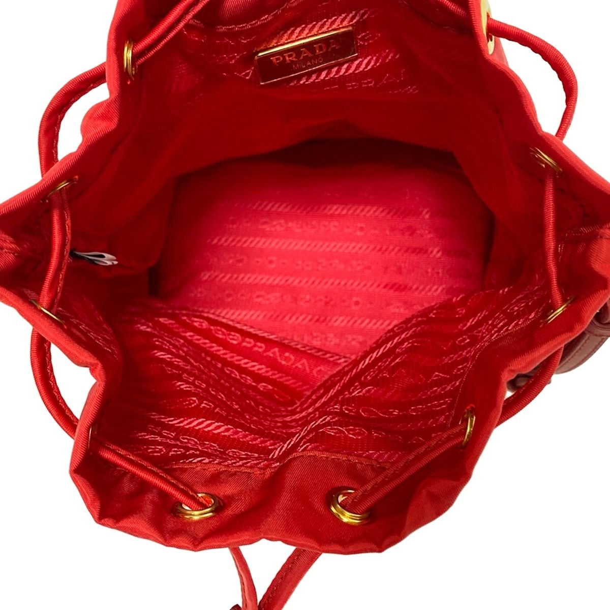 PRADA(プラダ) ポーチ - 1N1863 レッド 巾着型 レザー - メルカリ