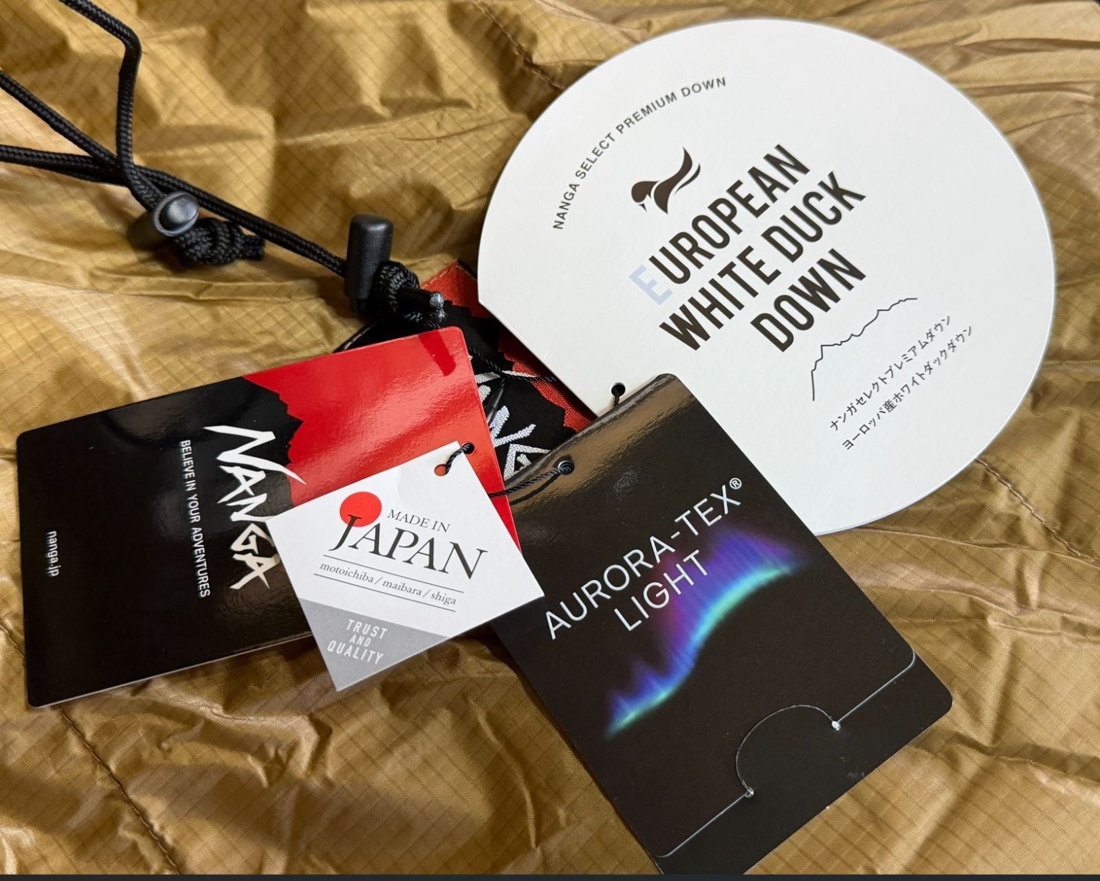 10 OFF 寒＆雪中 NANGA×3 ten ナンガ×サンテン 超撥水 軽量 AURORA TEX LIGHT ZOLO 88 DX オーロラライト 760 FP羽毛880 g レギュラー
