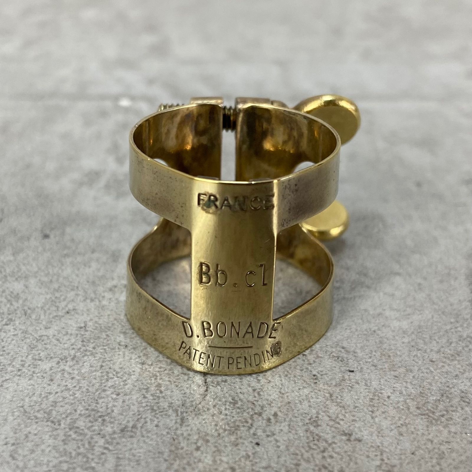 名品 ボナード B♭クラリネット用リガチャー Bb.cl BUZZ刻印 逆締め