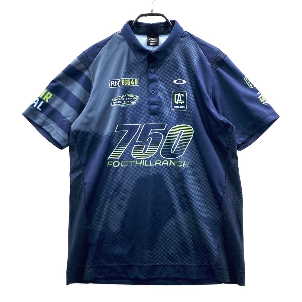 サイズ：XL OAKLEY オークリー  半袖ポロシャツ 総柄 ネイビー系 [240101553591] ゴルフウェア メンズ ストスト